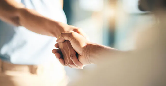 Two people shaking hands